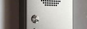 Wall-mounted listening station with push buttons and loudspeaker
